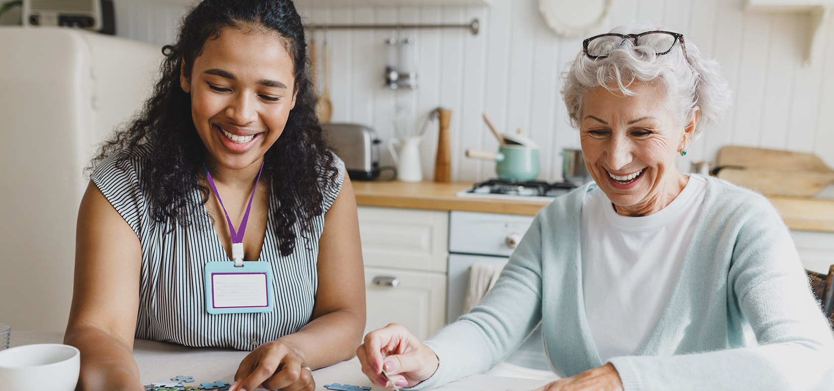 Woman with another woman at home.