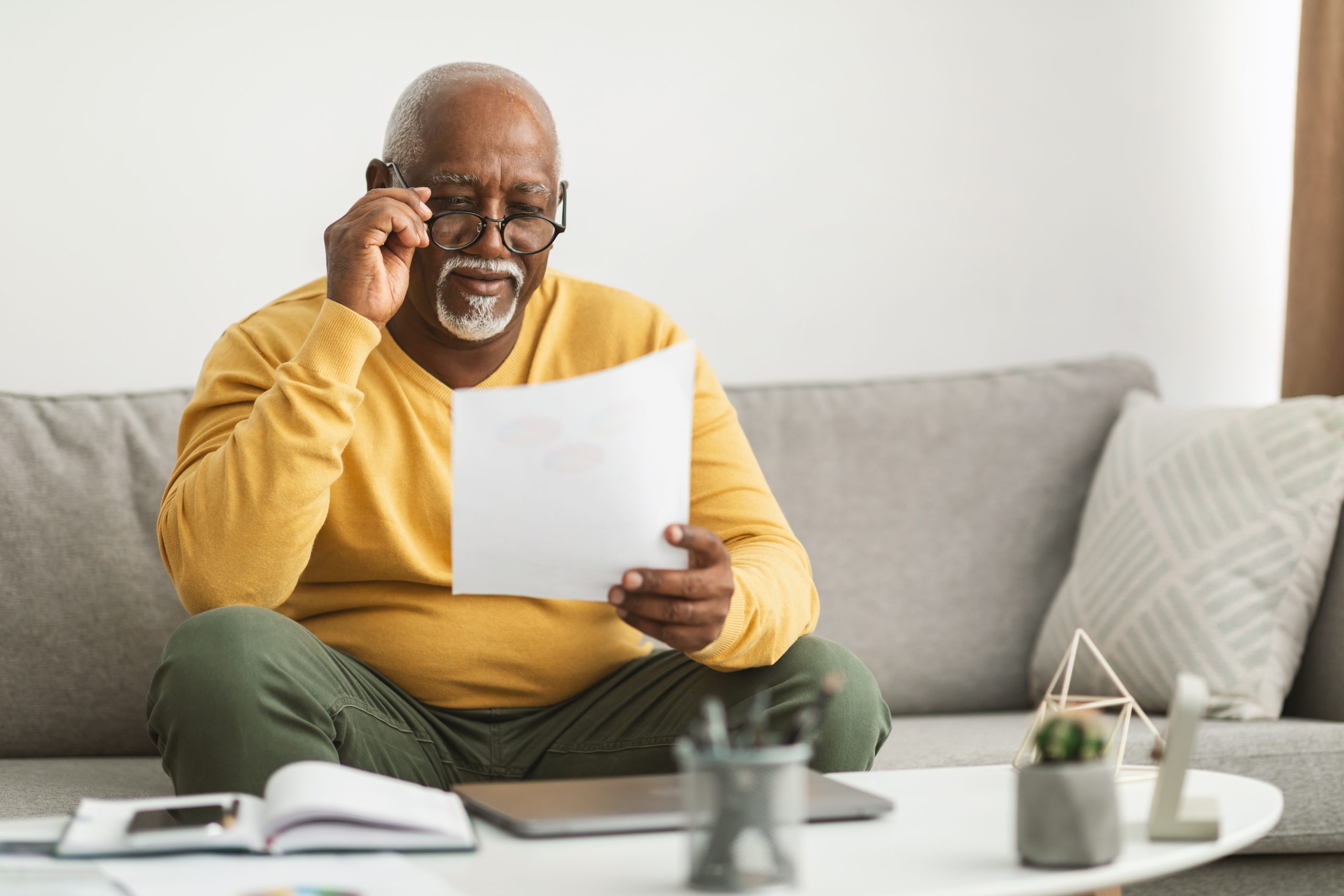 Man reading letter.