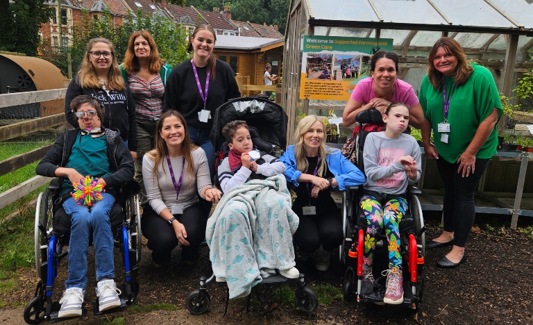 Members of Lifetime Team with the children they support at St Werburghs City Farm.
