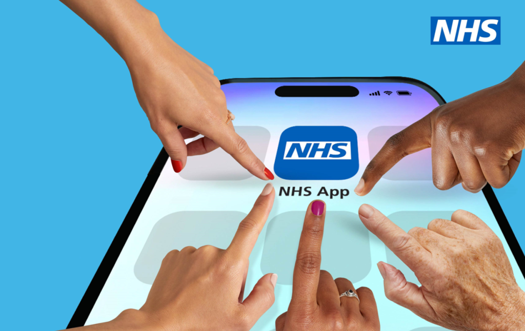 A picture of the NHS app on a mobile phone with four hands trying to touch it.