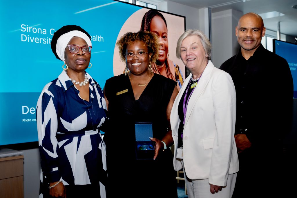 Deanna Berry accepting a Diversity Award at the Stepping Up ceremony.